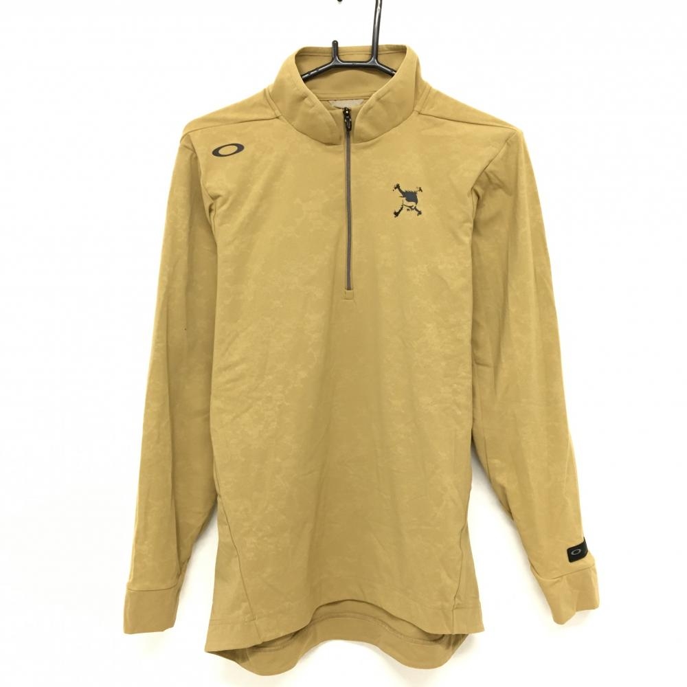 【美品】オークリー 長袖ハイネックシャツ ライトブラウン系 総柄地模様 ハーフジップ 胸ロゴ メンズ L ゴルフウェア Oakley