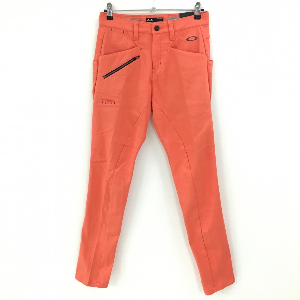 【新品】オークリー ストレッチパンツ オレンジ 立体裁断 肌面ドライポケット ティー装着可 メンズ 30 ゴルフウェア Oakley