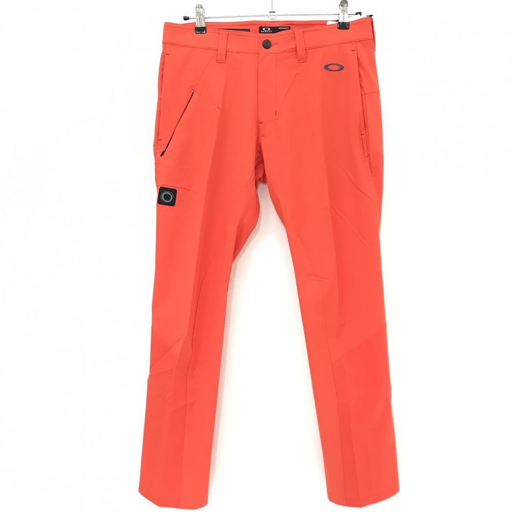 【新品】オークリー パンツ オレンジ ロゴ刺しゅう 立体裁断 ストレッチ メンズ 33 ゴルフウェア 2023年モデル Oakley