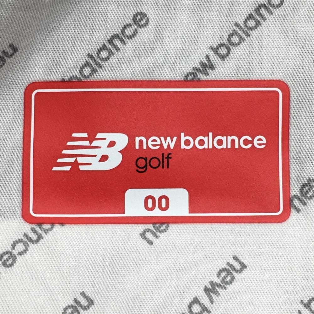 超美品】ニューバランス スカート ライトグリーン×黒 ハイビスカス柄