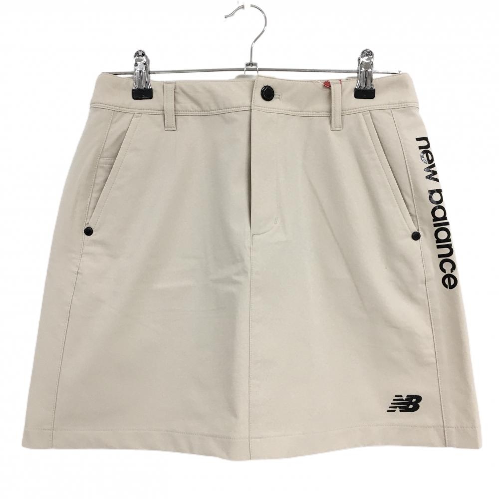 【新品】ニューバランスゴルフ スカート ベージュ×黒 サイドロゴ  レディース 2(L) ゴルフウェア 2025年モデル New Balance