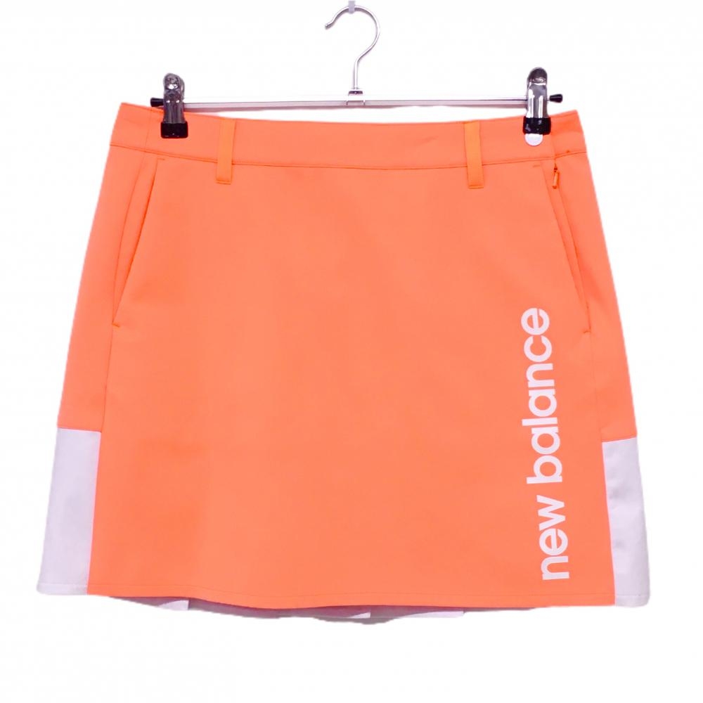 【美品】ニューバランスゴルフ スカート 蛍光オレンジ×白 後裾プリーツ レディース 2(L) ゴルフウェア New Balance