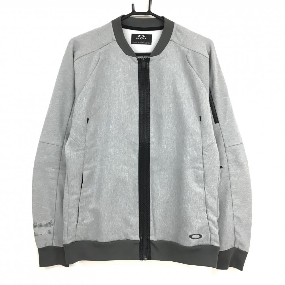 【美品】オークリー ジャケット 杢グレー 左袖ジップポケット メンズ L ゴルフウェア Oakley